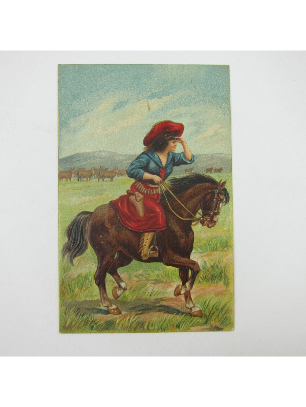 Postcard Western Cowgirl Woman on Horse Red Hat Skirt Pistol Embossed Antique
